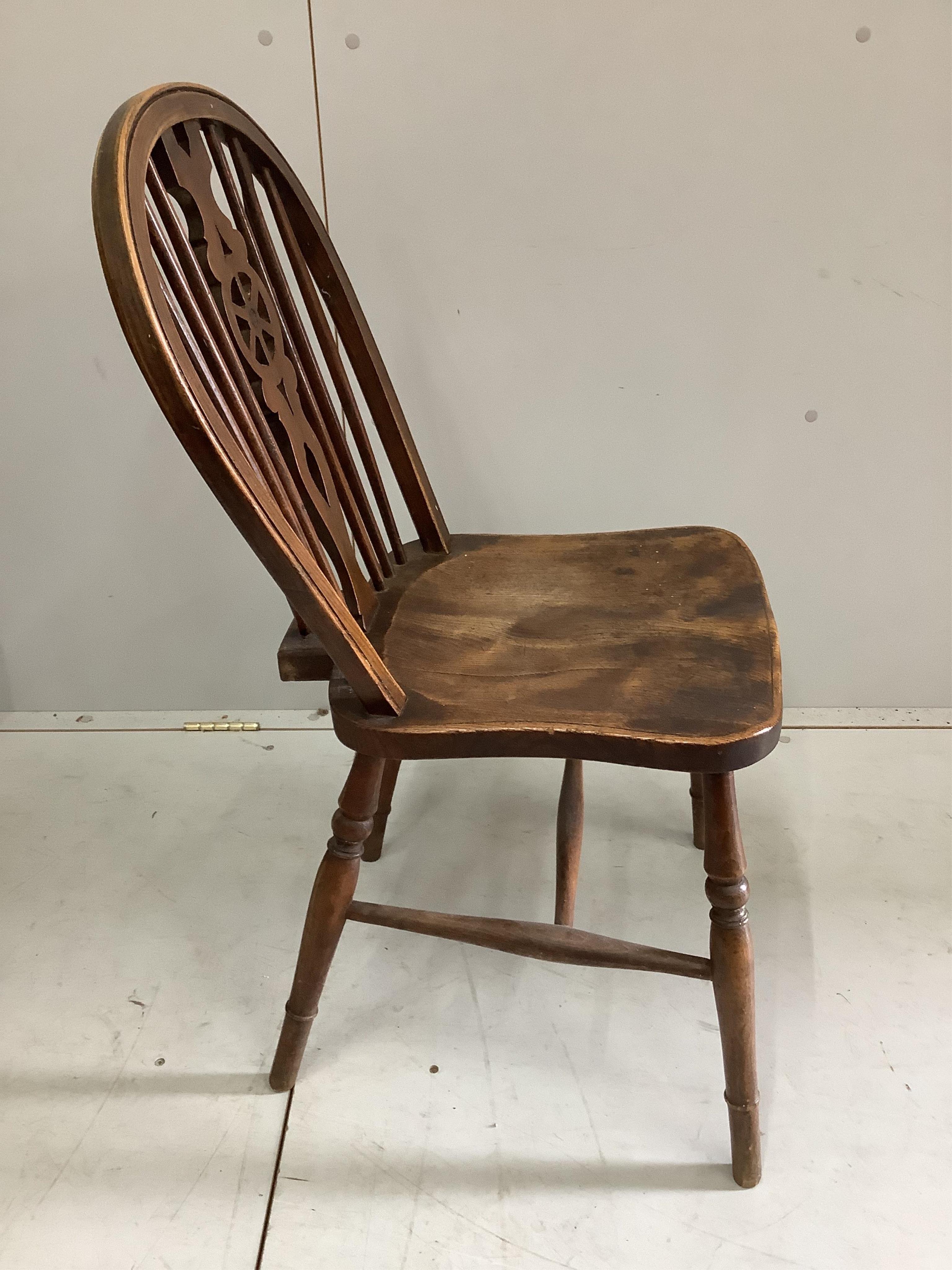 Six Victorian ash, elm and beech Windsor wheelback dining chairs. Condition - poor to fair